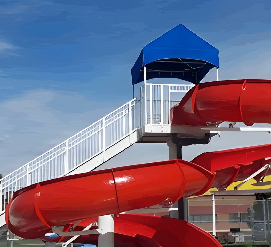 Red pool slide after restoration with renewed color
