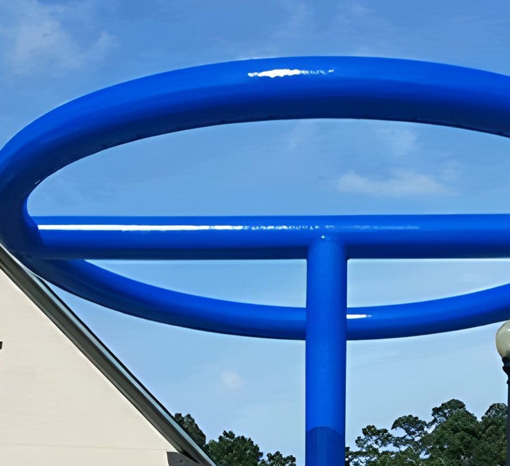 Water feature ring structure after restoration — smooth blue finish