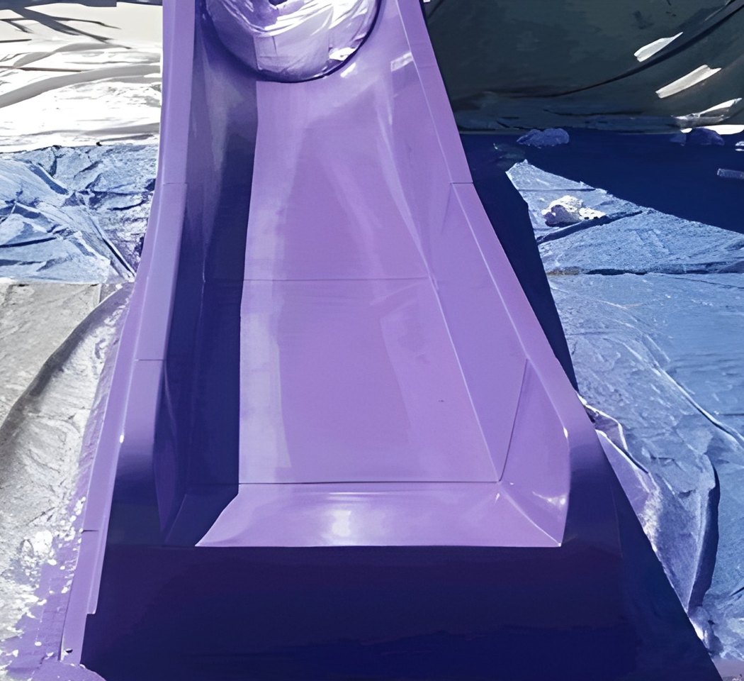 Glossy purple waterslide after restoration