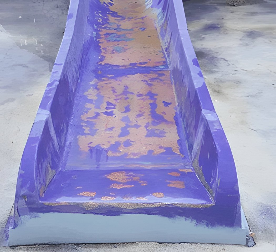 Faded purple waterslide before restoration